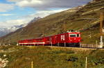 Lokomotiva: HGe 4/4 107 | Vlak: R 12 ( Brig - Disentis/Muster ) | Msto a datum: Oberalppasshhe-Calmot 04.07.1996