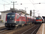 Lokomotiva: 1116.209, 1144.063 | Vlak: RJ 166 ( Wien Westbf. - Zürich HB ), REX 1625 ( St.Valentin - Wien Westbf. ) | Místo a datum: Wien-Hütteldorf   16.03.2013