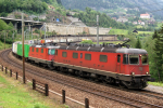 Lokomotiva: Re 6/6 11654 + Re 4/4 11168 | Vlak: IM 40209 ( Antwerpen DS Oorderen - Novara ) | Místo a datum: Wassen 20.06.2006
