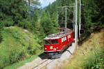 Lokomotiva: Ge 6/6 705 | Vlak: D 525 Bernina-Express ( Chur - St.Moritz ) | Místo a datum: Bergün/Bravuogn 05.08.1994