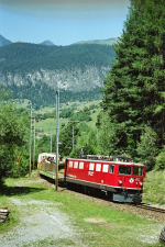 Lokomotiva: Ge 6/6 706 | Vlak: R 3535 ( Filisur - Preda ) | Místo a datum: Filisur 20.07.2003