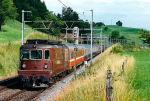 Lokomotiva: Re 4/4 175 | Vlak: IC 813 Monteverdi ( Basel SBB - Brig ) | Místo a datum: Kumm 05.07.1996