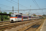 Lokomotiva: 452.003-7 | Vlak: Os 9183 ( Kolín - Benešov u Prahy ) | Místo a datum: Benešov u Prahy   26.07.1994